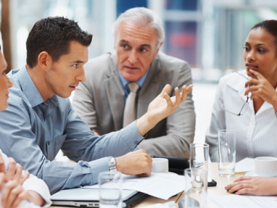 Five people at business meeting