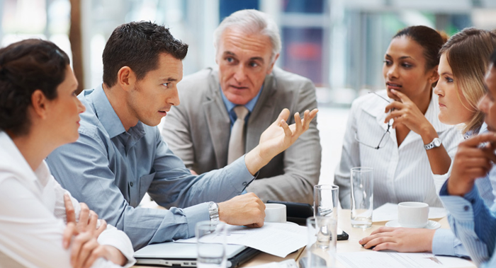 Five people at business meeting