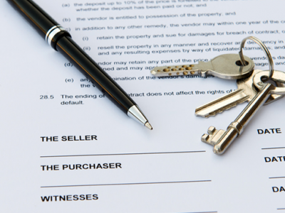 Real Estate documents with keys